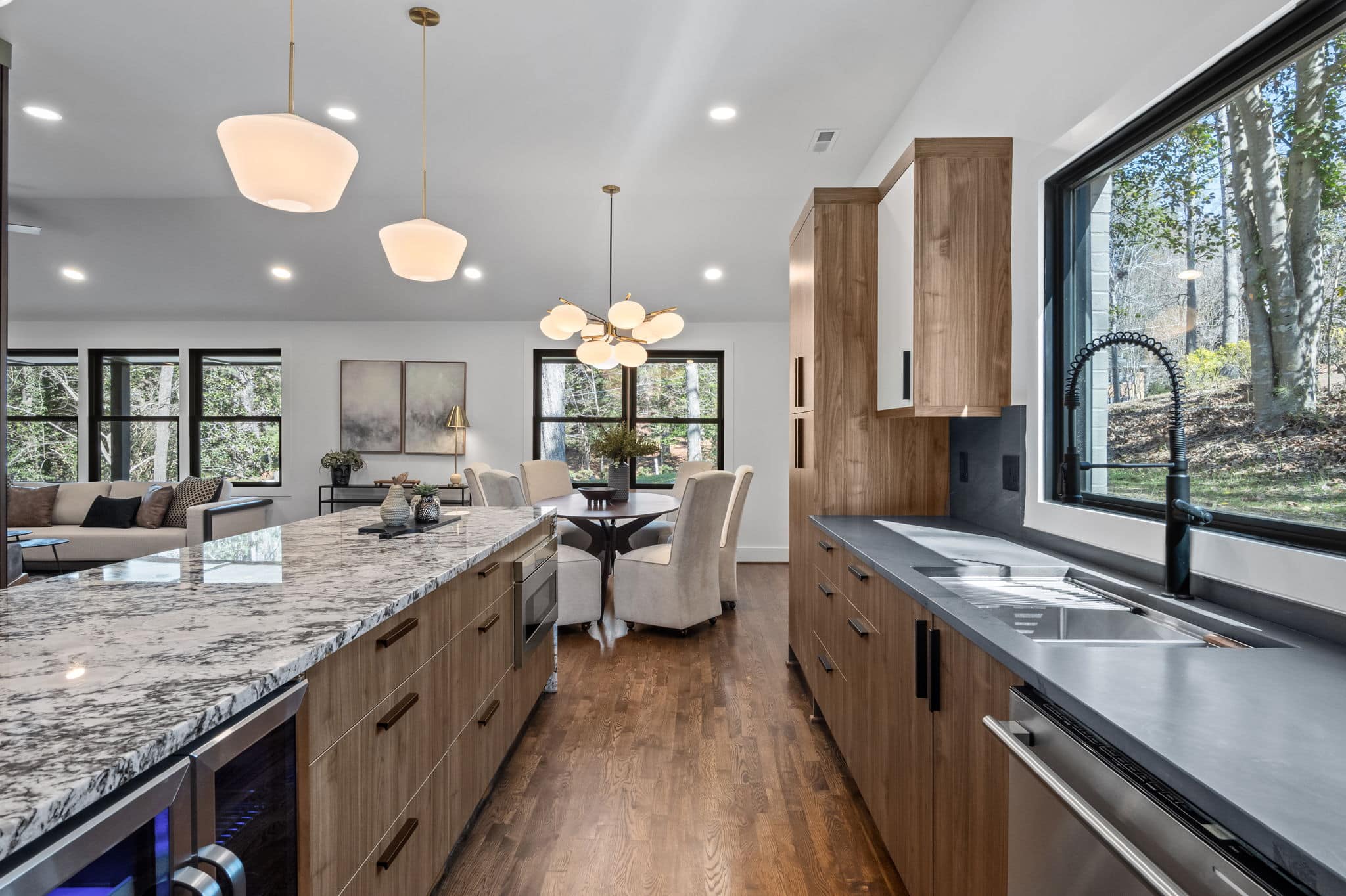 Open-plan kitchen and dining room remodeled by Green Hill Contracting